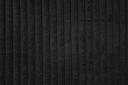 The Driscoll Black Corduroy Sectional with Ottoman – 4 Piece